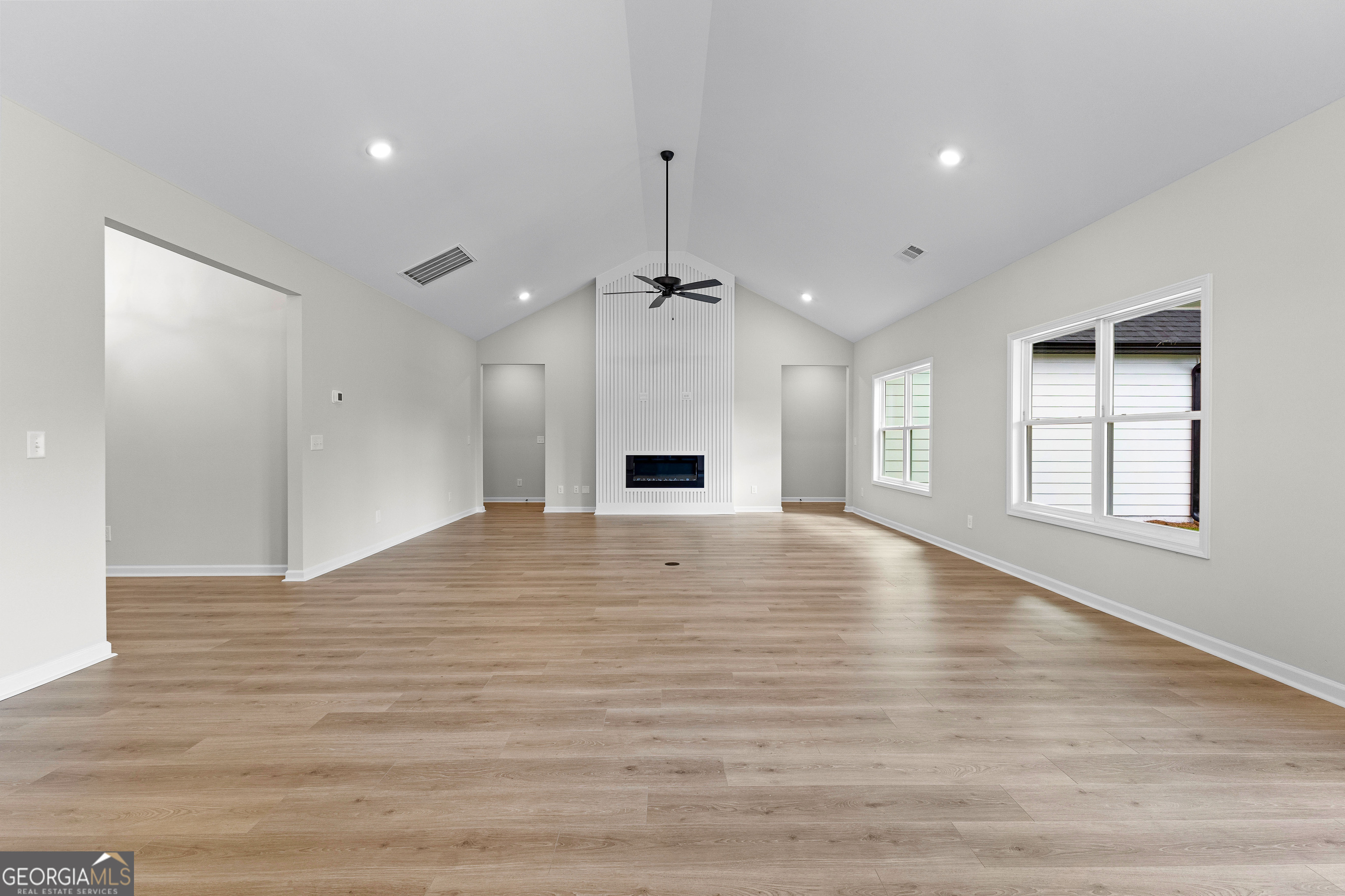 1210 Waymanville Road Thomaston, GA 30286 - Photo 11 of 45 a view of an empty room with window and wooden floor