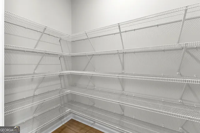 a view of a room with racks on the wall