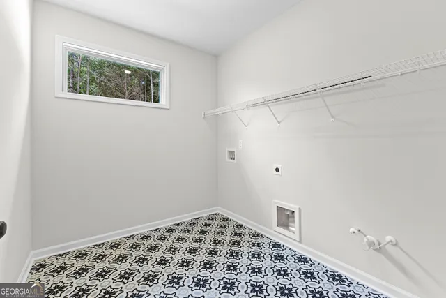 a bathroom with a window and a shower