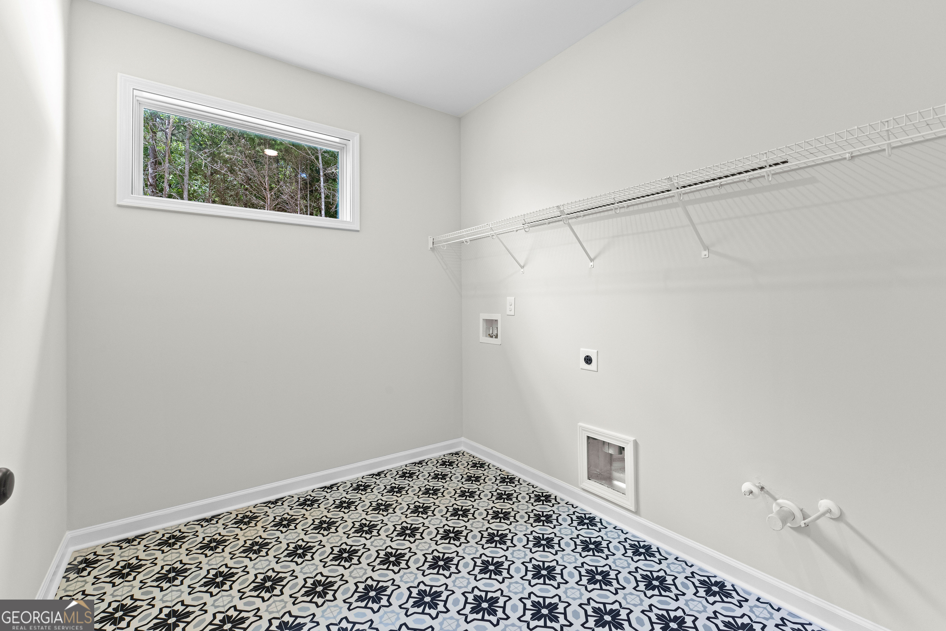 1210 Waymanville Road Thomaston, GA 30286 - Photo 21 of 45 a bathroom with a window and a shower