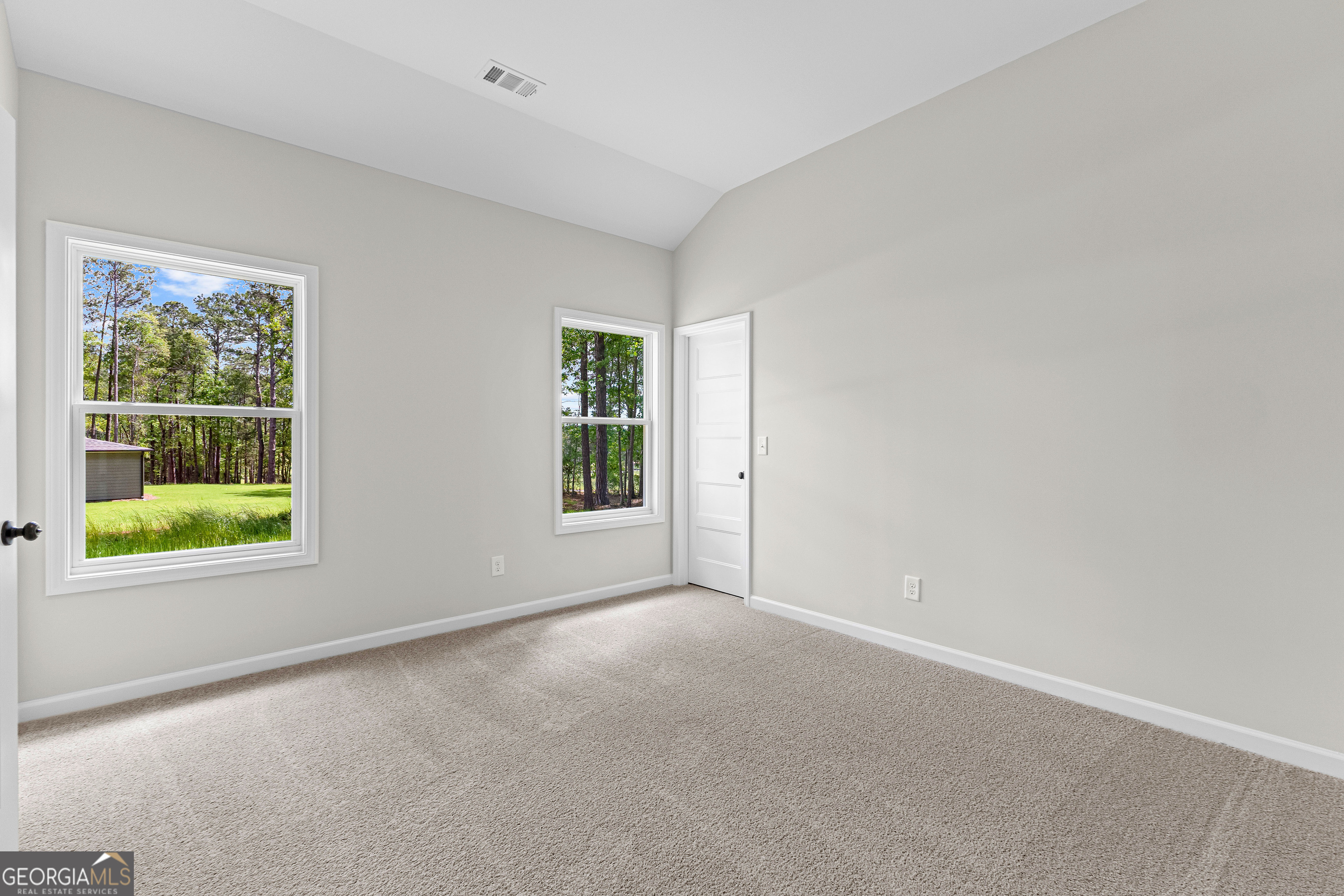 1210 Waymanville Road Thomaston, GA 30286 - Photo 26 of 45 an empty room with windows