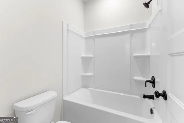 an empty room with an entryway