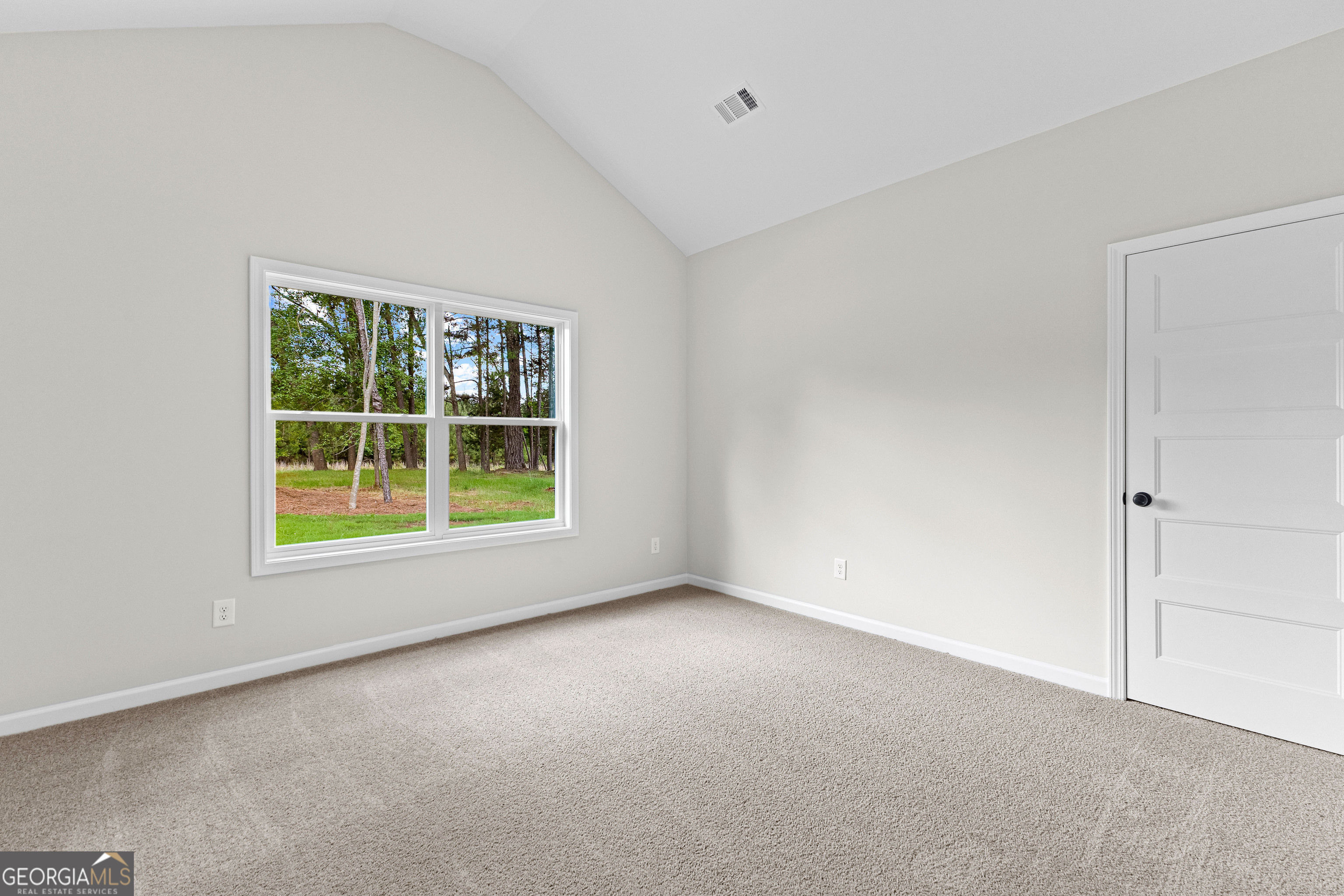 1210 Waymanville Road Thomaston, GA 30286 - Photo 30 of 45 an empty room with a window