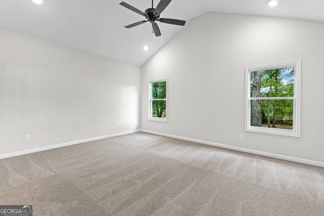 an empty room with windows