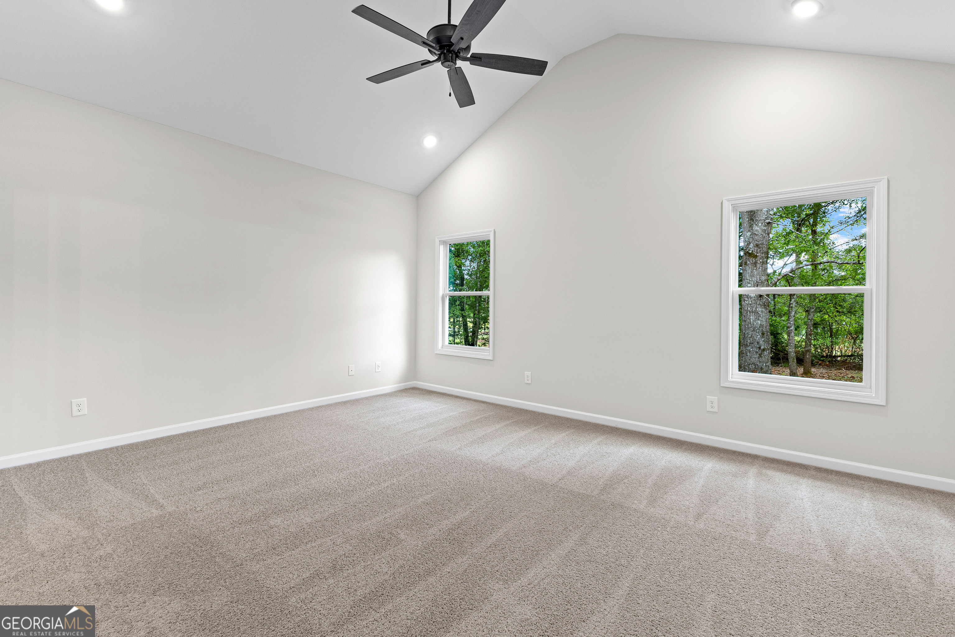 1210 Waymanville Road Thomaston, GA 30286 - Photo 33 of 45 an empty room with windows and closet