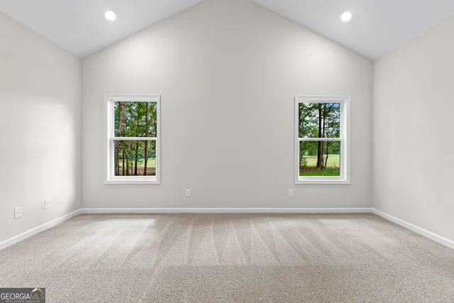 a white bath tub sitting next to a white sink