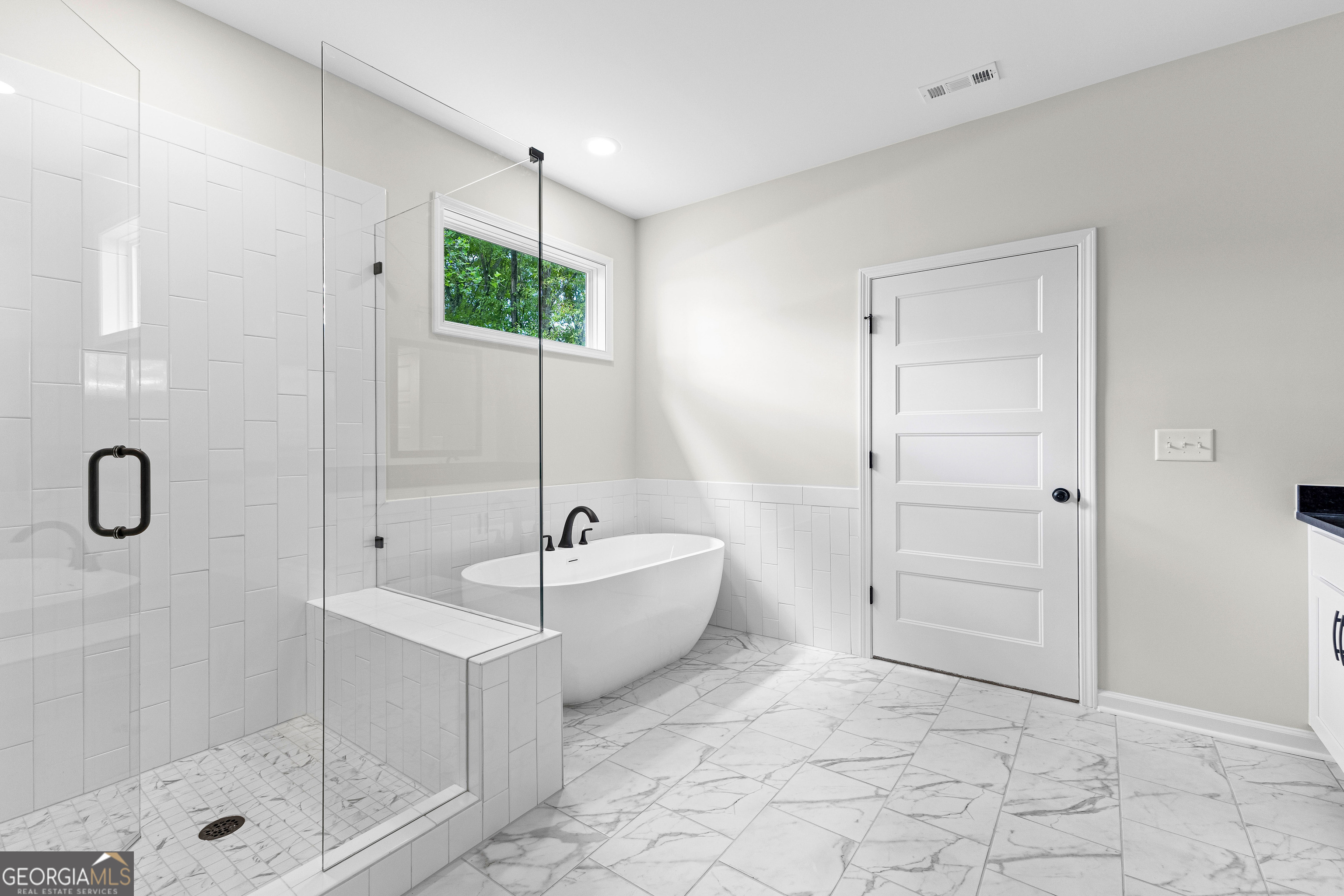 1210 Waymanville Road Thomaston, GA 30286 - Photo 39 of 45 a bathroom with a tub shower and mirror