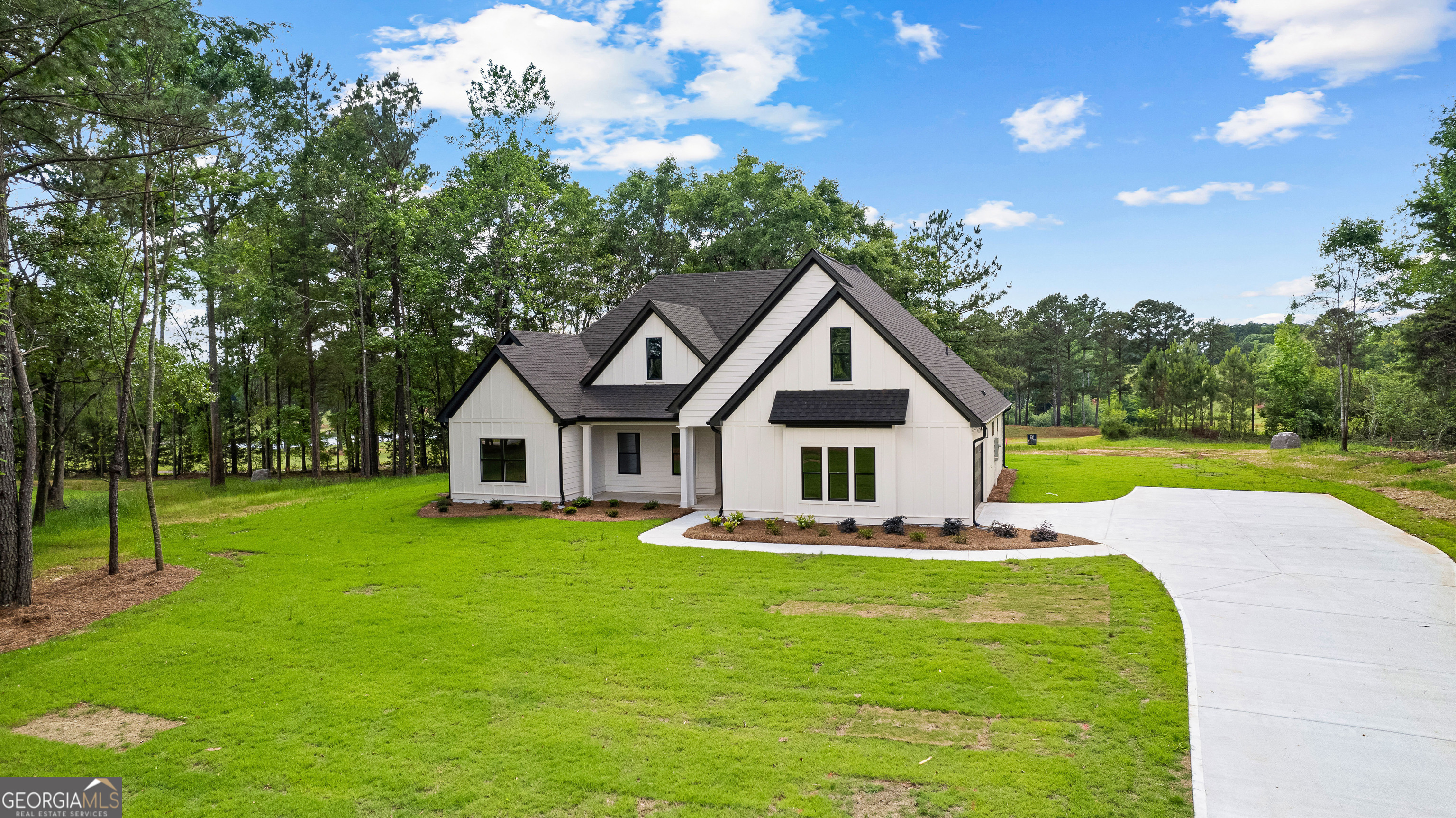 1210 Waymanville Road Thomaston, GA 30286 - Photo 4 of 45 a front view of a house with garden