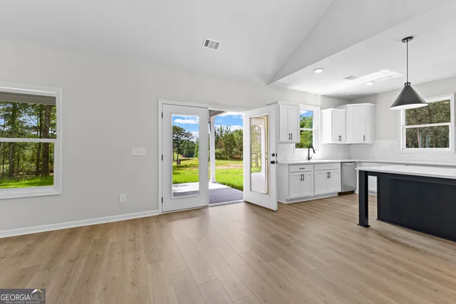 a view of swimming pool with an outdoor space and seating area