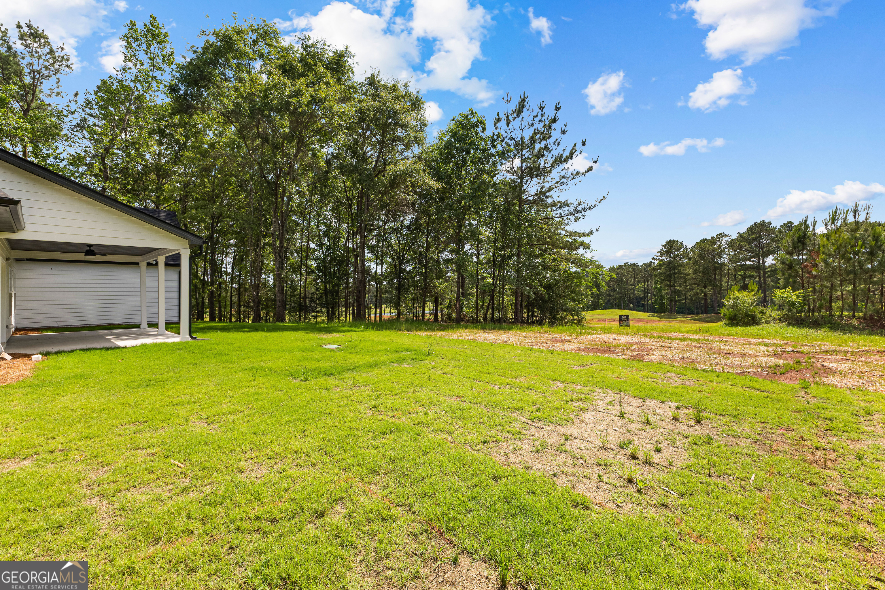 1210 Waymanville Road Thomaston, GA 30286 - Photo 43 of 45 a view of swimming pool with an outdoor space and seating area