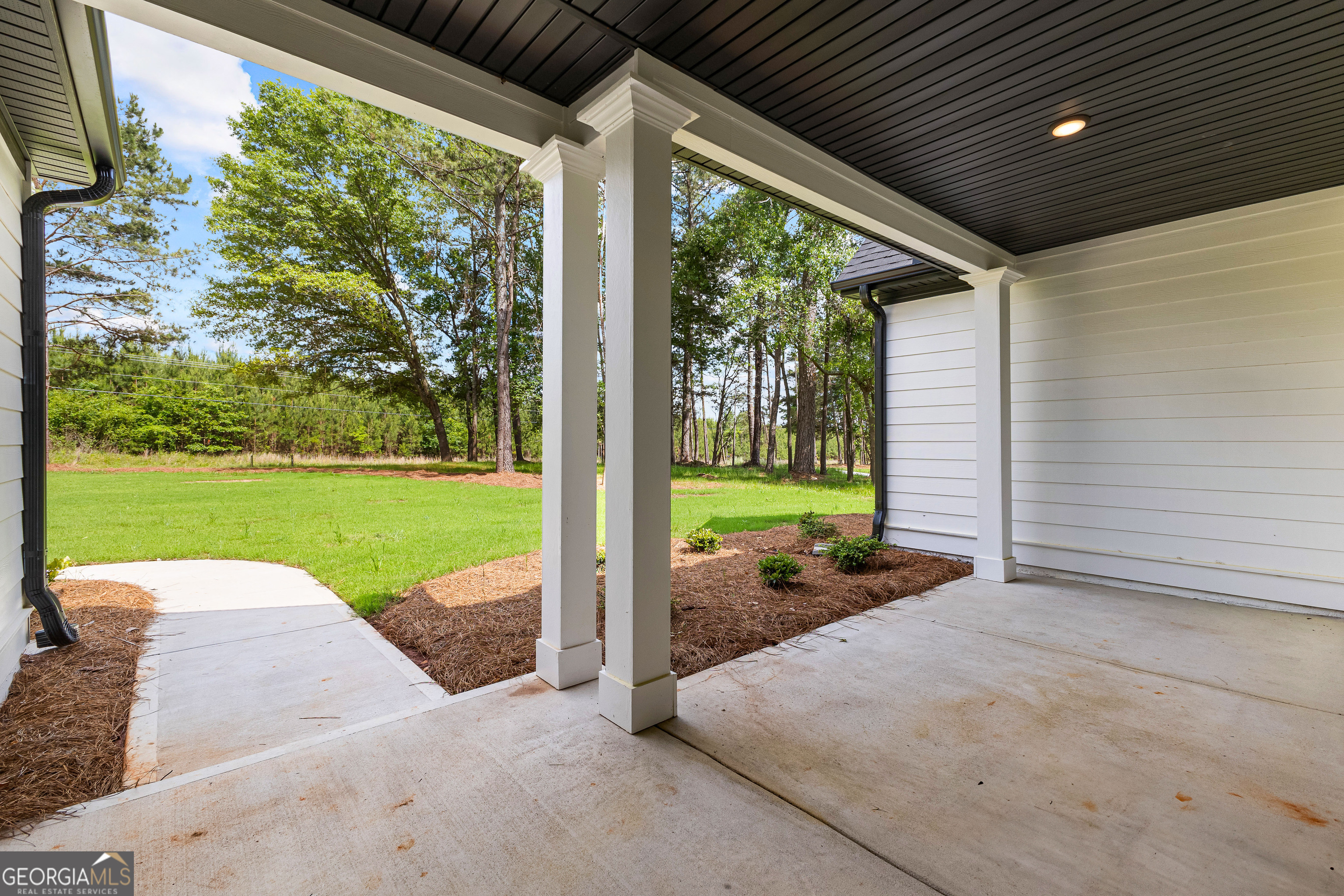 1210 Waymanville Road Thomaston, GA 30286 - Photo 6 of 45 a view of a house with backyard porch and garden