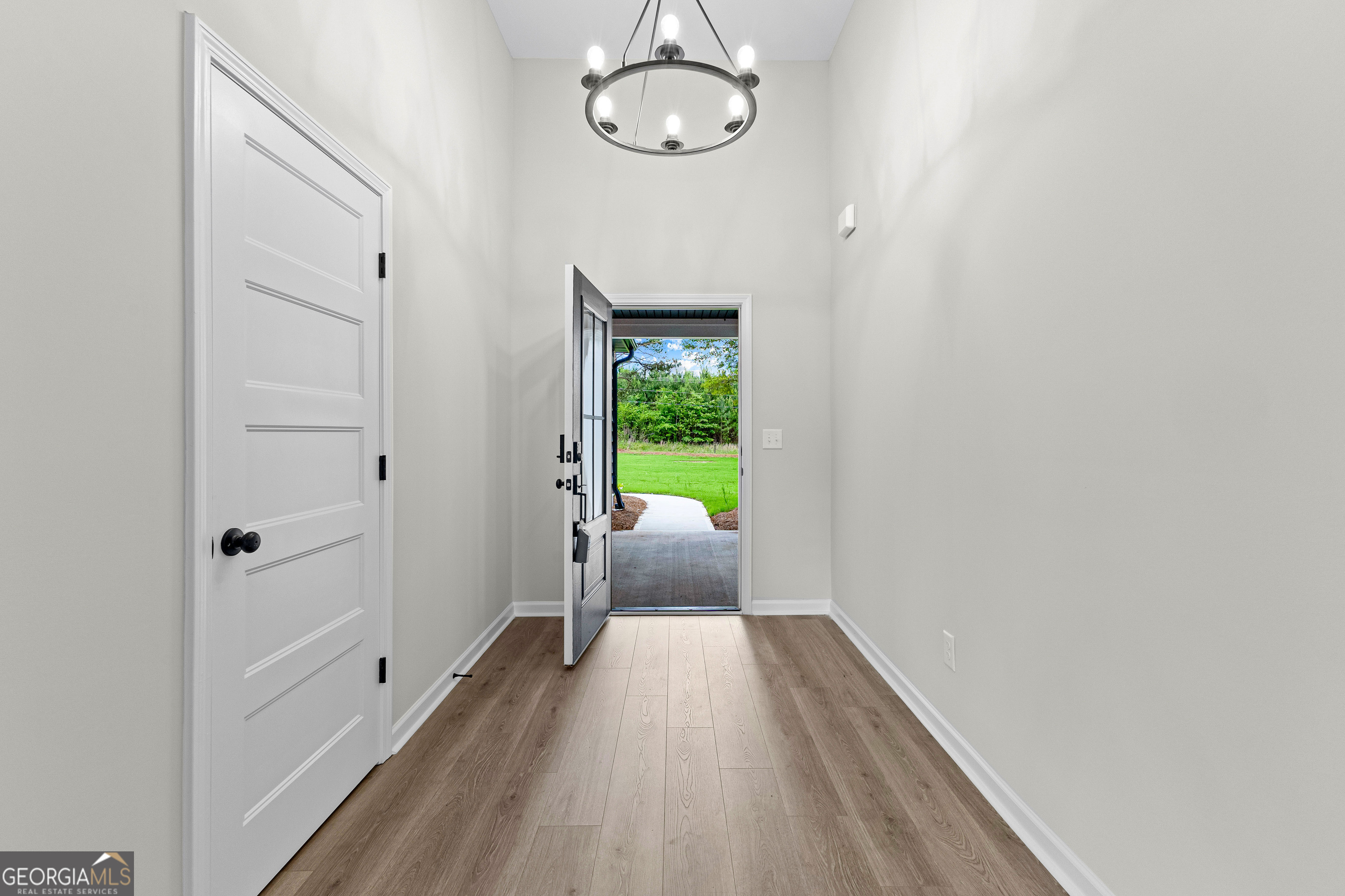 1210 Waymanville Road Thomaston, GA 30286 - Photo 7 of 45 a view of bedroom with wooden floor