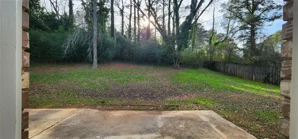 a view of a yard in front of a house
