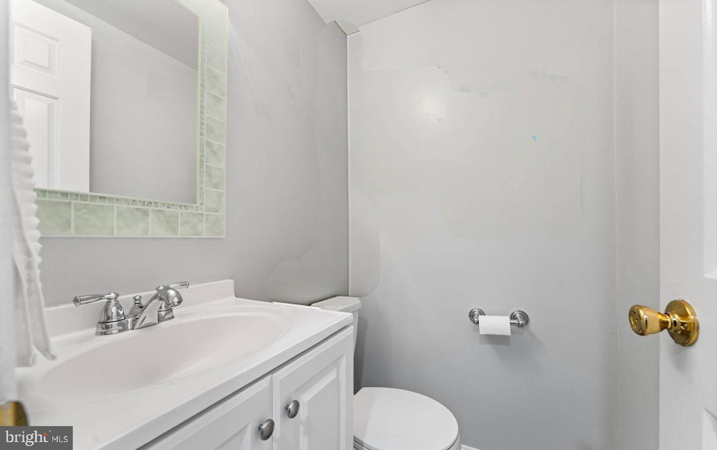 1124 25th Street Northwest, Unit T4 Washington, DC 20037 - Photo 9 of 21 a bathroom with a sink and a toilet
