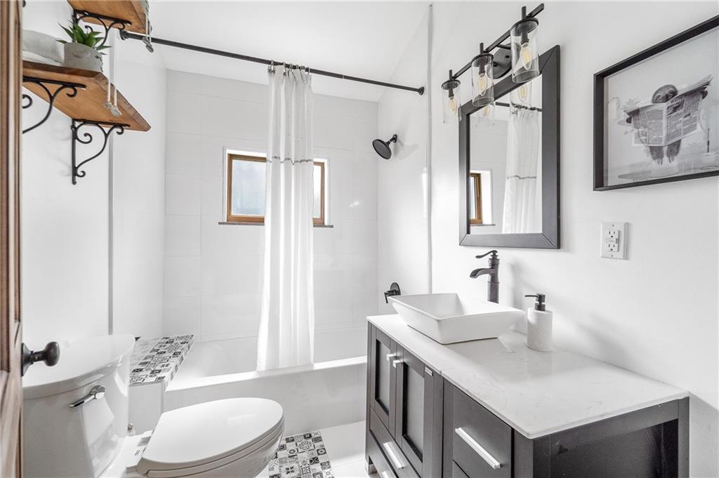 16 5th Street Carnegie, PA 15106 - Photo 15 of 31 a bathroom with a sink a toilet and shower