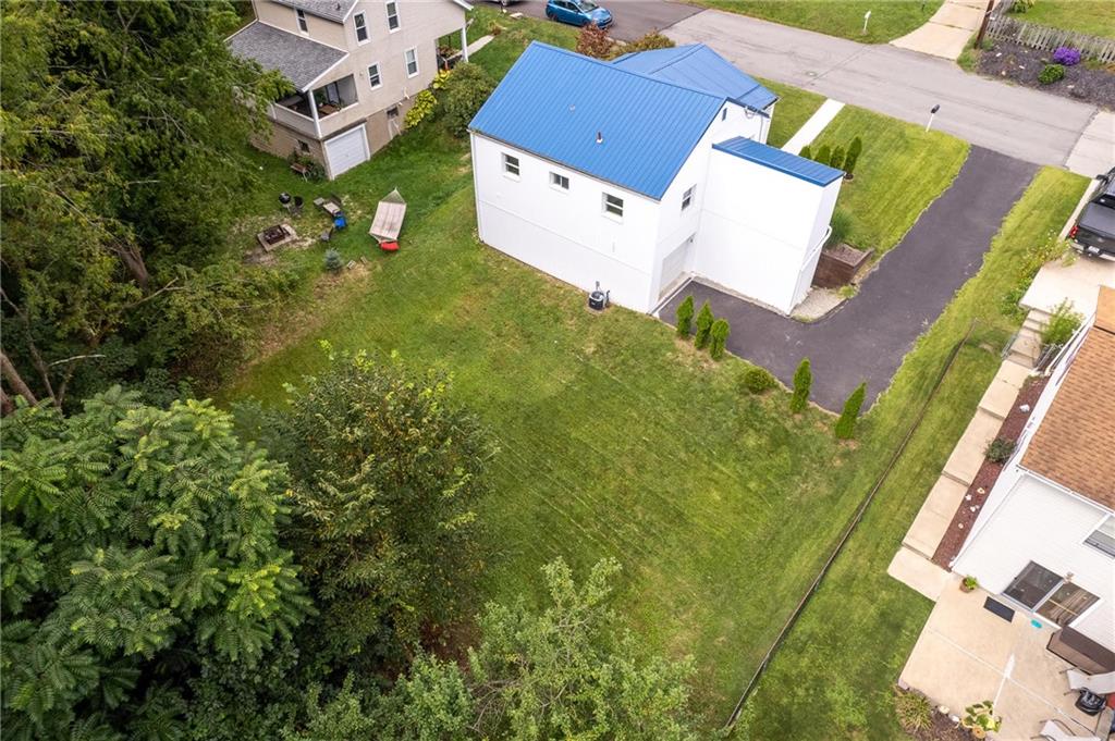 16 5th Street Carnegie, PA 15106 - Photo 28 of 31 an aerial view of residential houses with outdoor space and trees all around