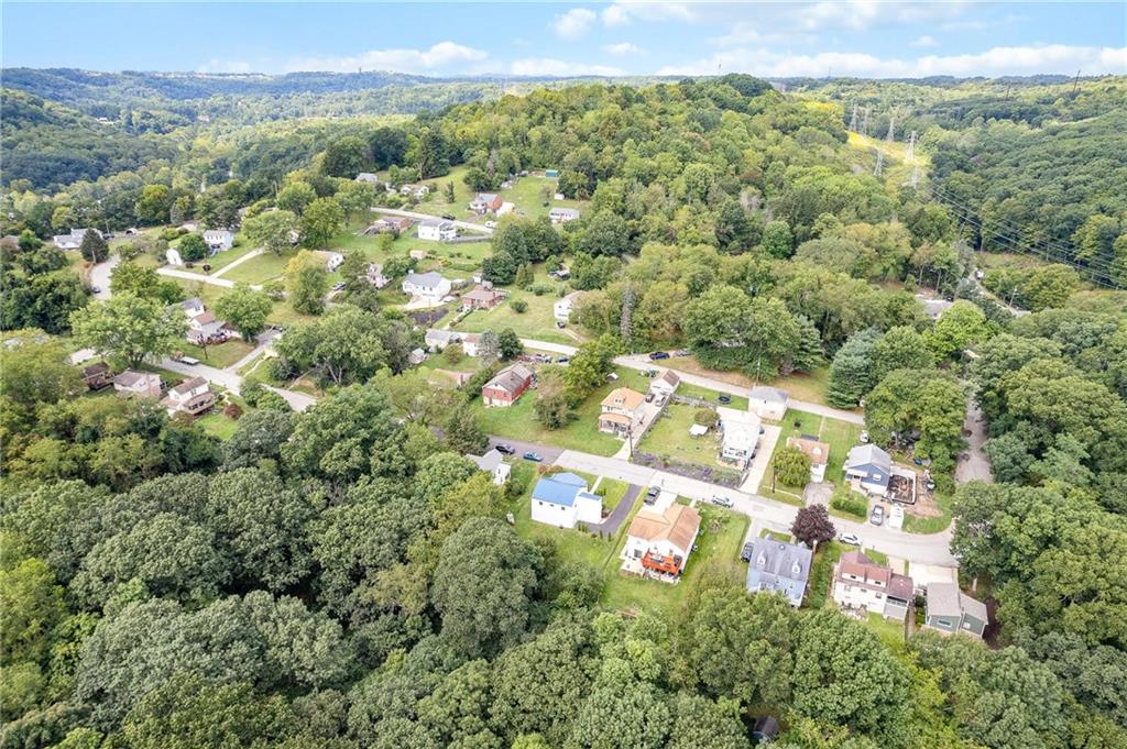 16 5th Street Carnegie, PA 15106 - Photo 30 of 31 a view of a city with lush green forest