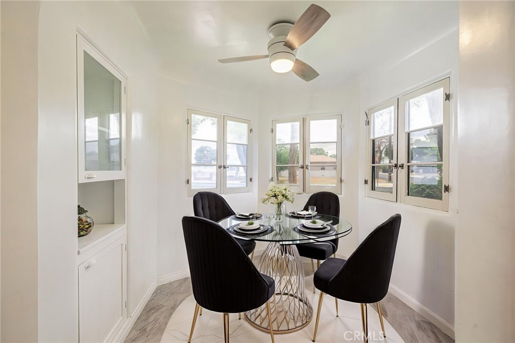 44603 Fig Avenue Lancaster, CA 93534 - Photo 15 of 39 a living room with furniture and two windows