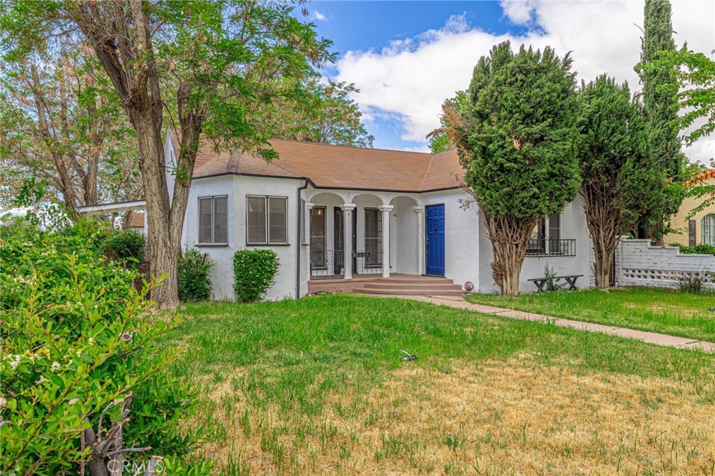 44603 Fig Avenue Lancaster, CA 93534 - Photo 2 of 39 front view of a house with a yard
