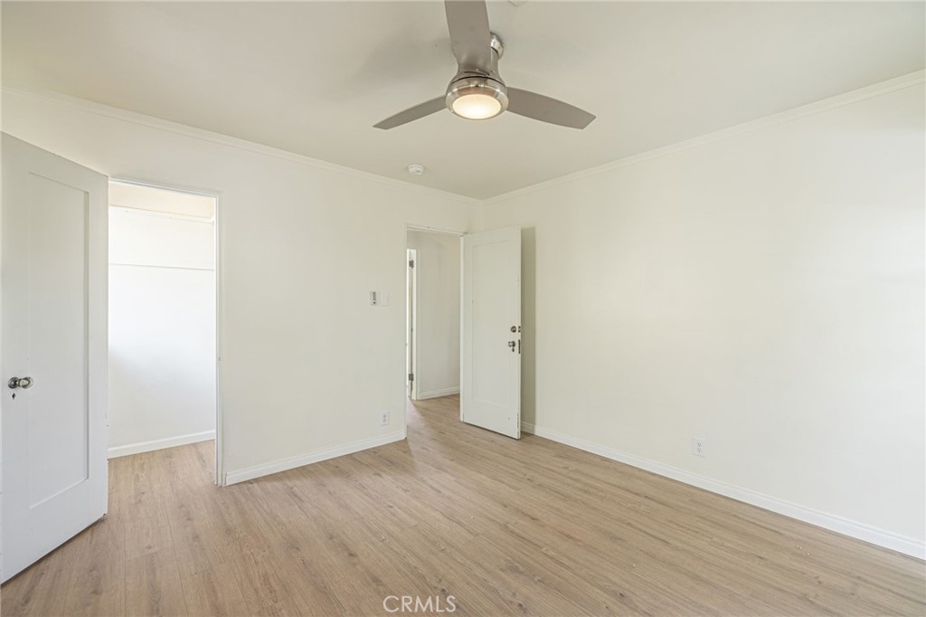 44603 Fig Avenue Lancaster, CA 93534 - Photo 28 of 39 a view of an empty room with wooden floor