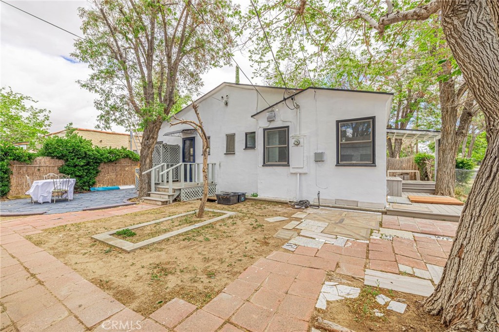 44603 Fig Avenue Lancaster, CA 93534 - Photo 37 of 39 a view of a house with snow on the wall