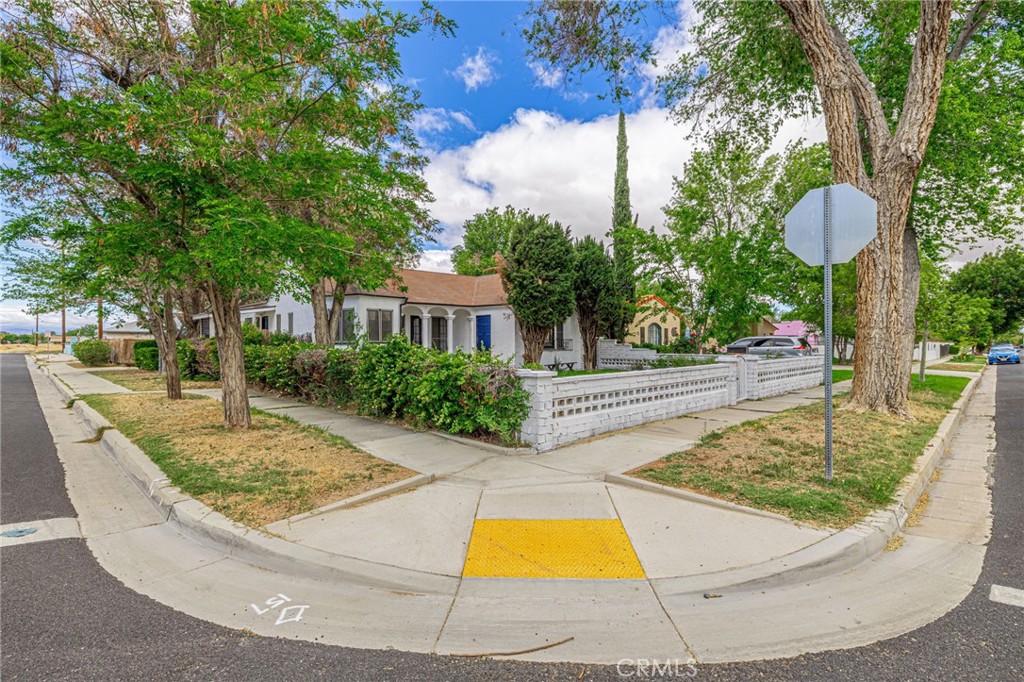 44603 Fig Avenue Lancaster, CA 93534 - Photo 6 of 39 a view of a swimming pool with a patio