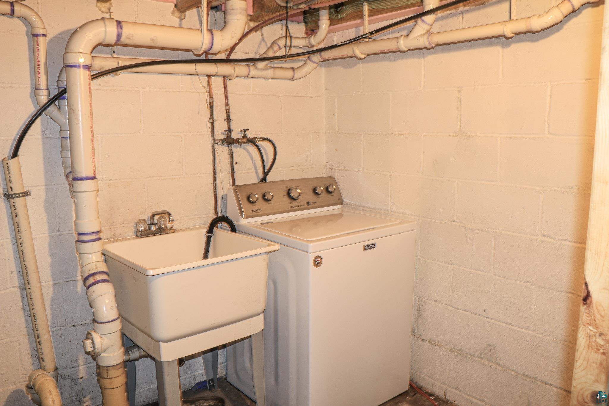 4857 Rutter Road Duluth, MN 55803 - Photo 19 of 27 Washing machine basement