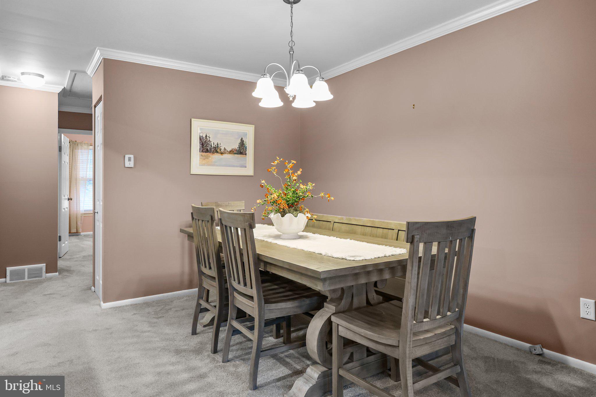 185 Greendale Road Philadelphia, PA 19154 - Photo 12 of 26 a dining room with furniture and chandelier