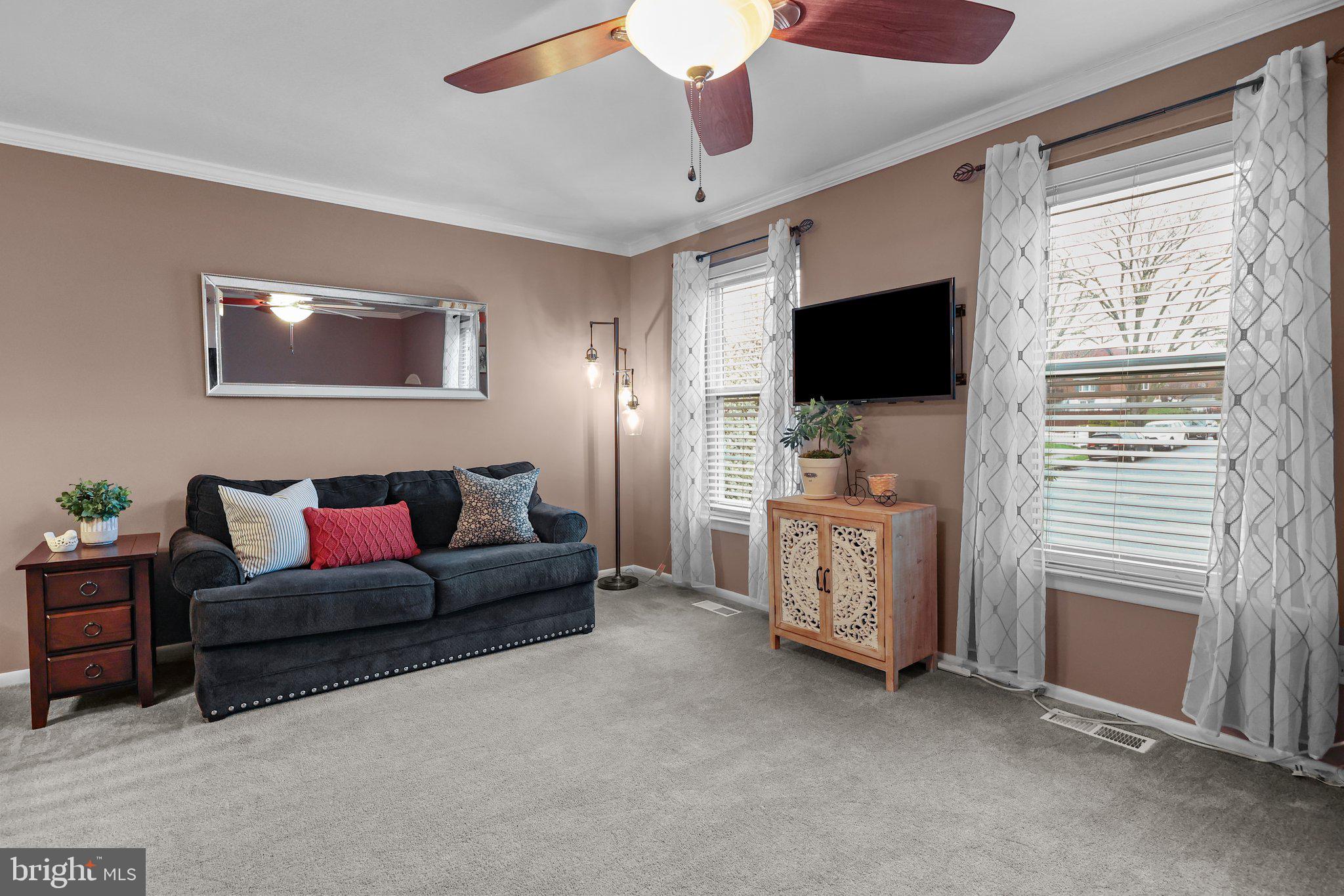 185 Greendale Road Philadelphia, PA 19154 - Photo 6 of 26 a living room with furniture and a flat screen tv