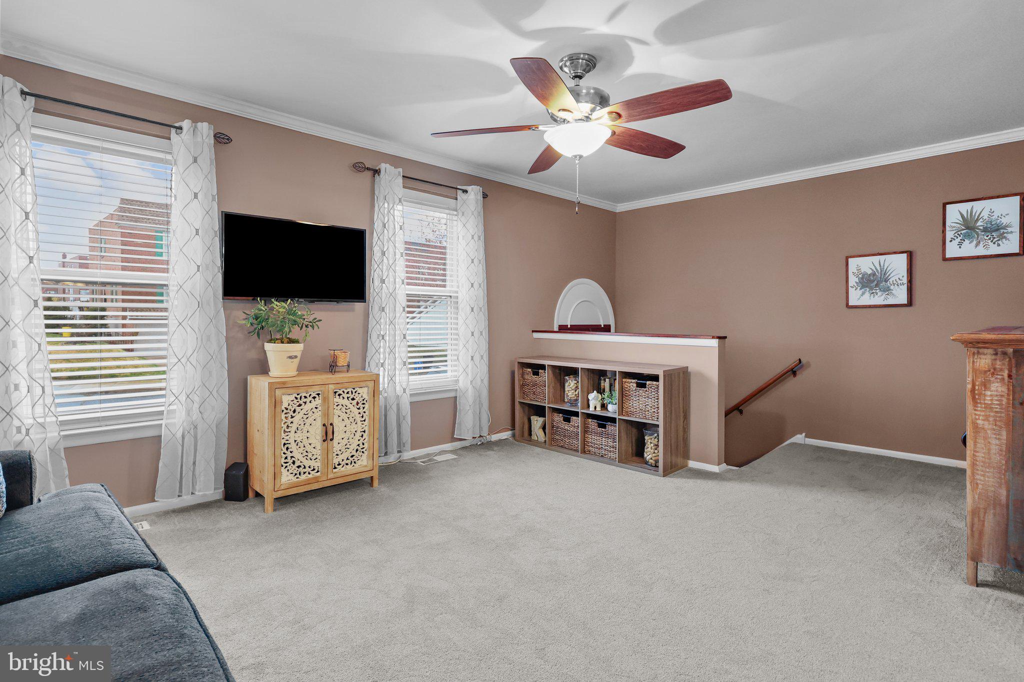 185 Greendale Road Philadelphia, PA 19154 - Photo 7 of 26 a living room with furniture and a flat screen tv