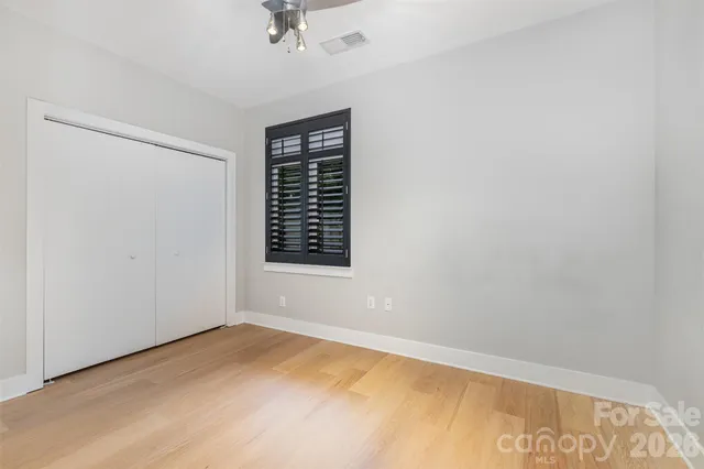 a bathroom with a sink and vanity