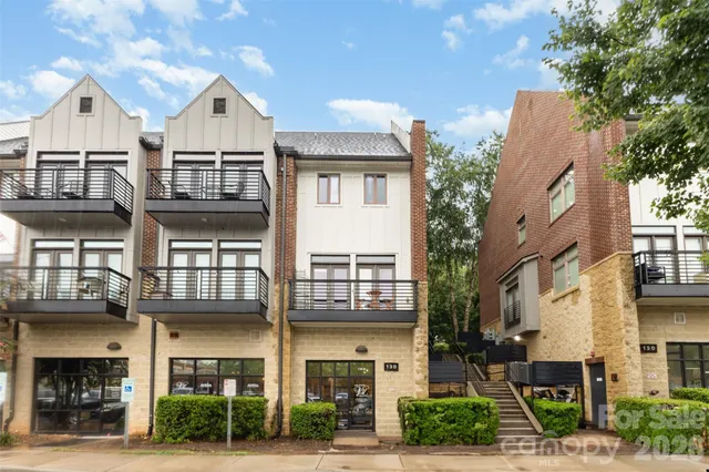 a front view of a building with street view