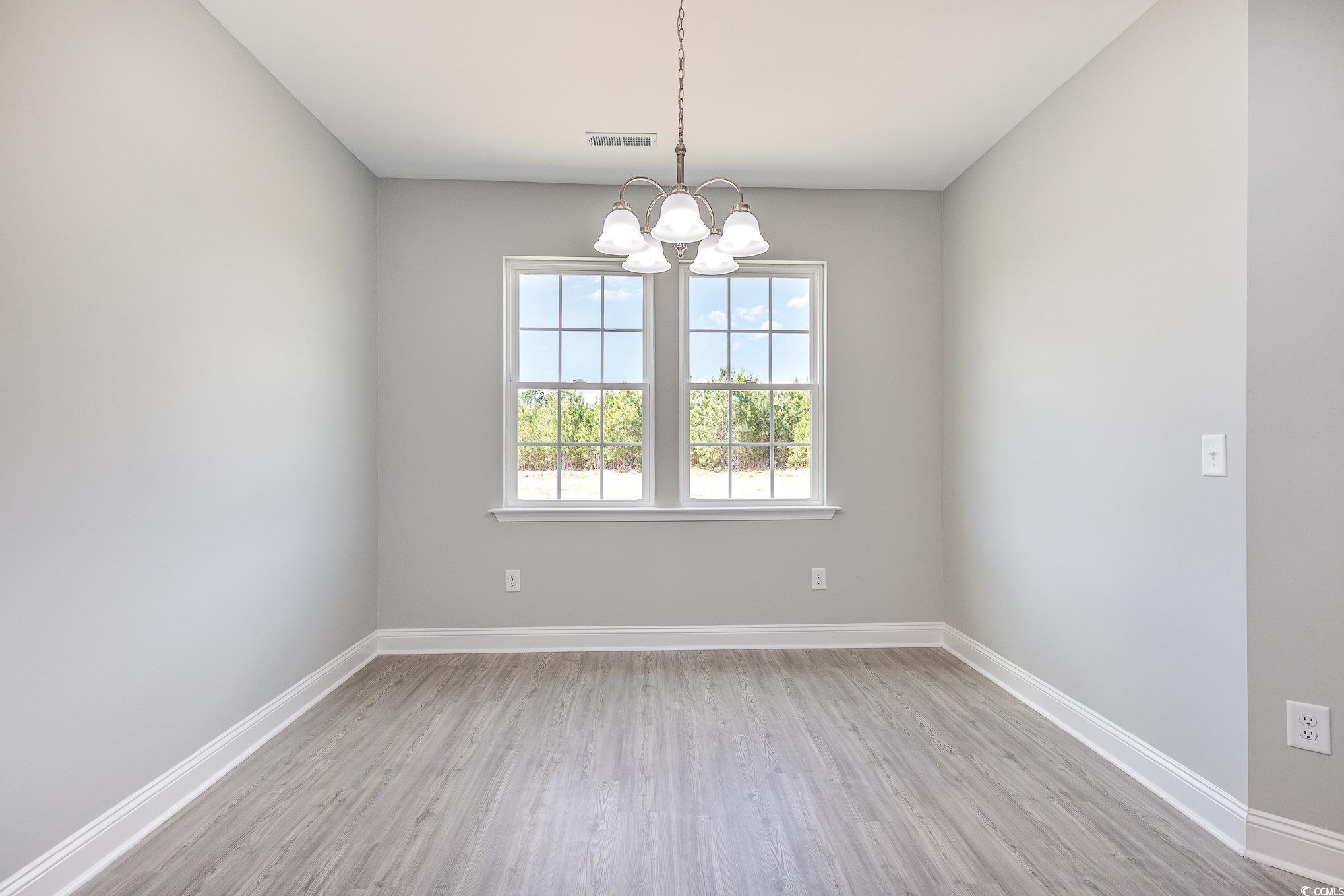 363 Log Cabin Road Loris, SC 29569 - Photo 14 of 30 Unfurnished room featuring light hardwood / wood-s