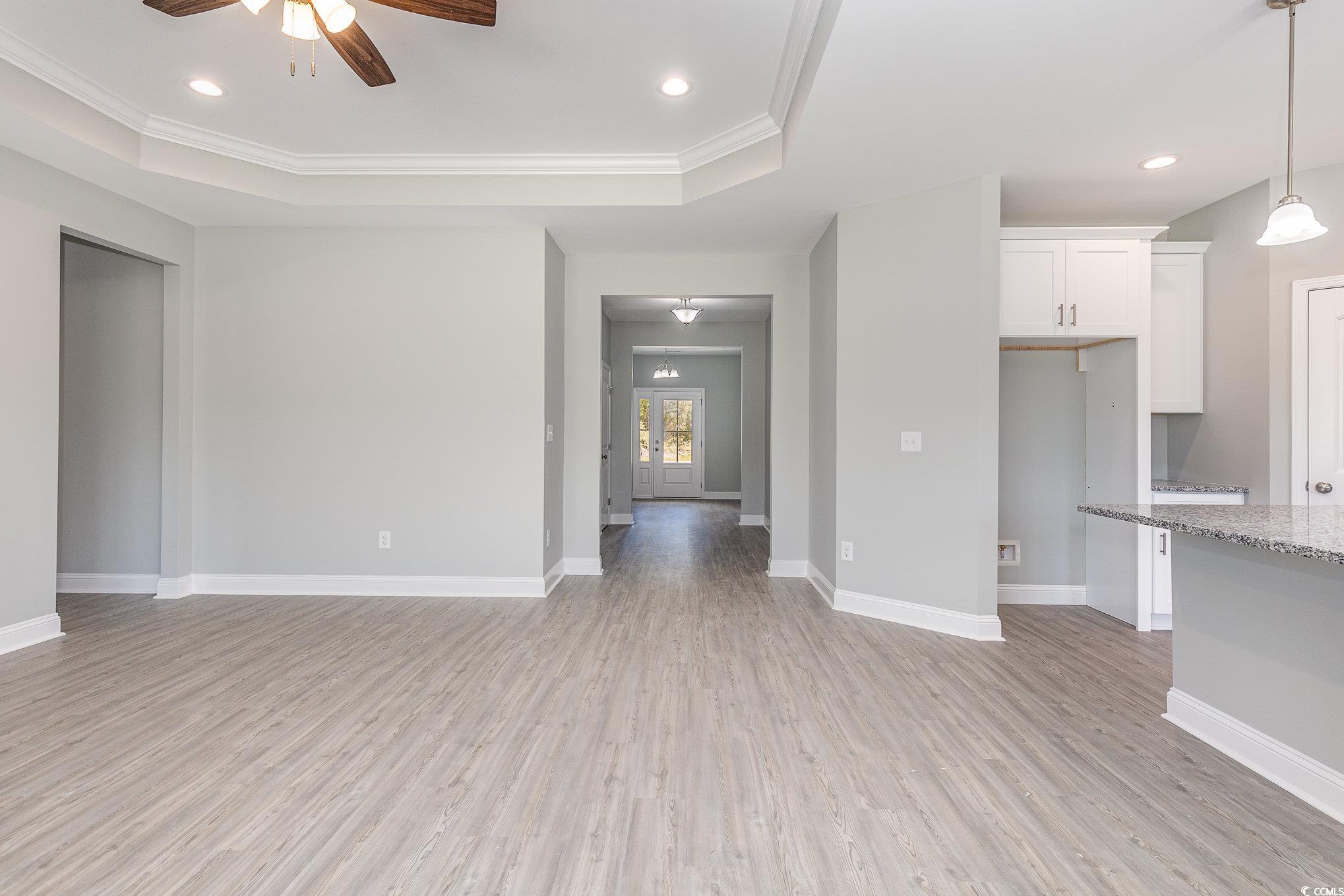 363 Log Cabin Road Loris, SC 29569 - Photo 4 of 30 Unfurnished living room featuring ceiling fan, lig