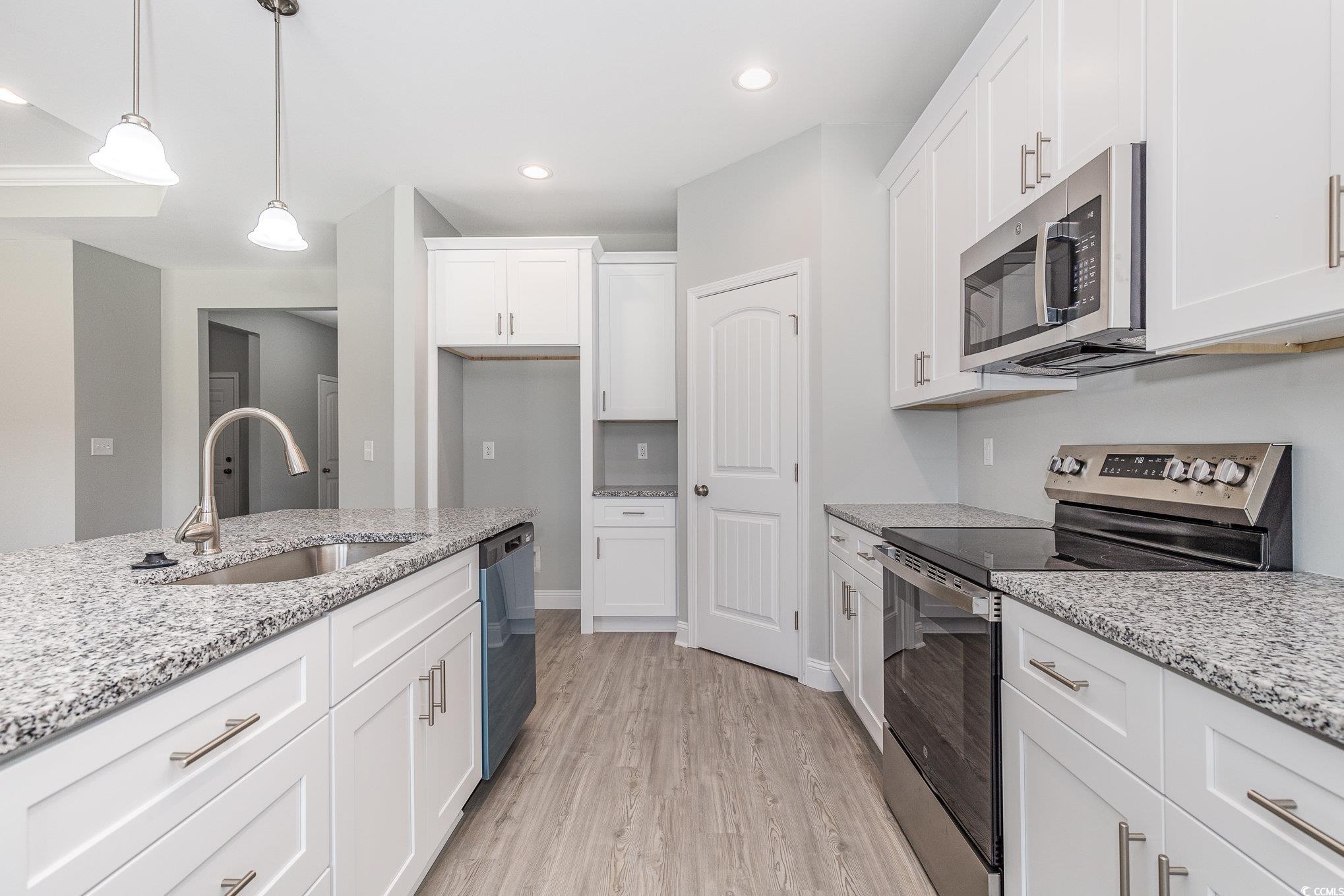 363 Log Cabin Road Loris, SC 29569 - Photo 10 of 30 Kitchen with appliances with stainless steel finis