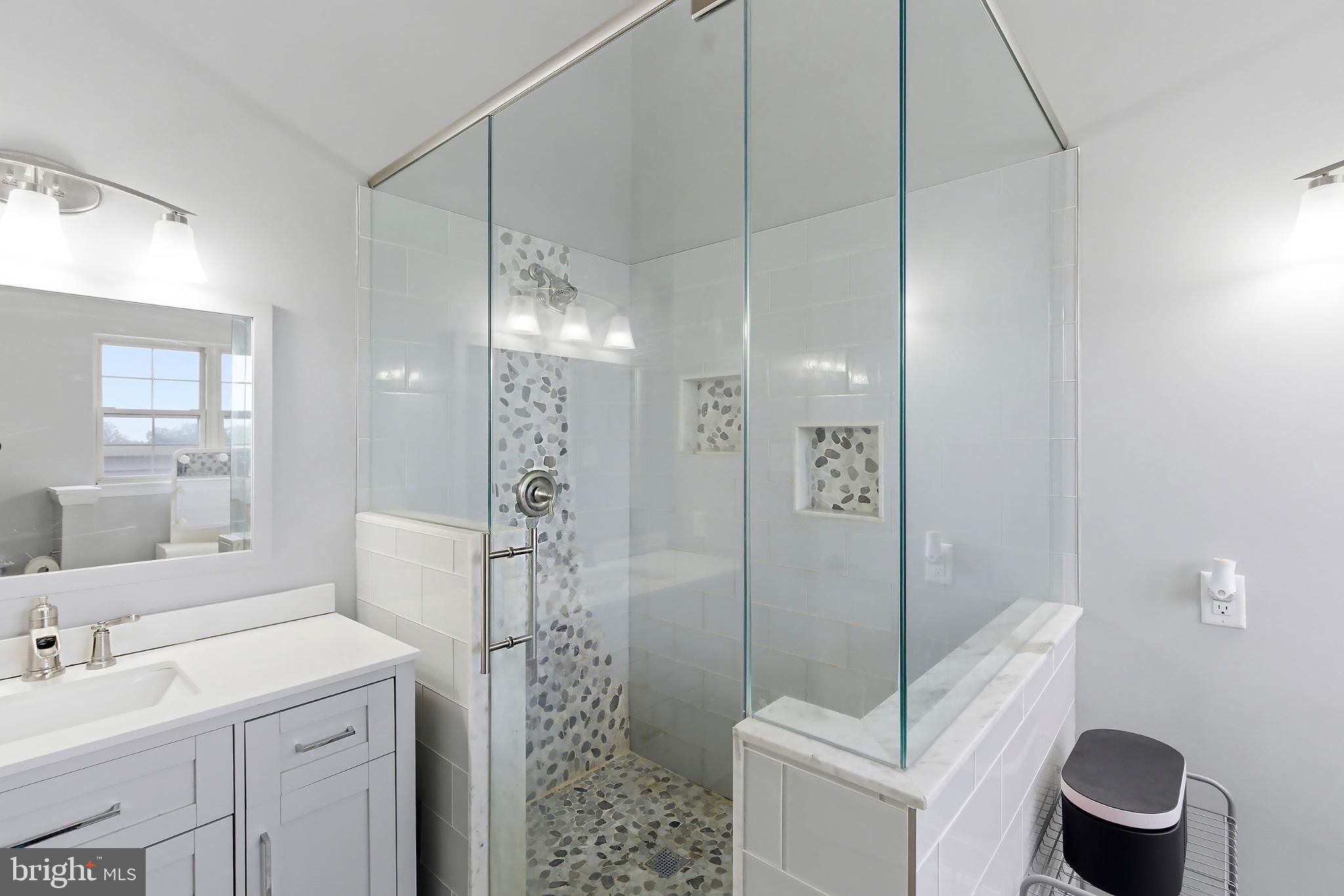3036 Main Street, Unit 3036 Voorhees, NJ 08043 - Photo 11 of 24 Sleek modern bathroom with glass shower.