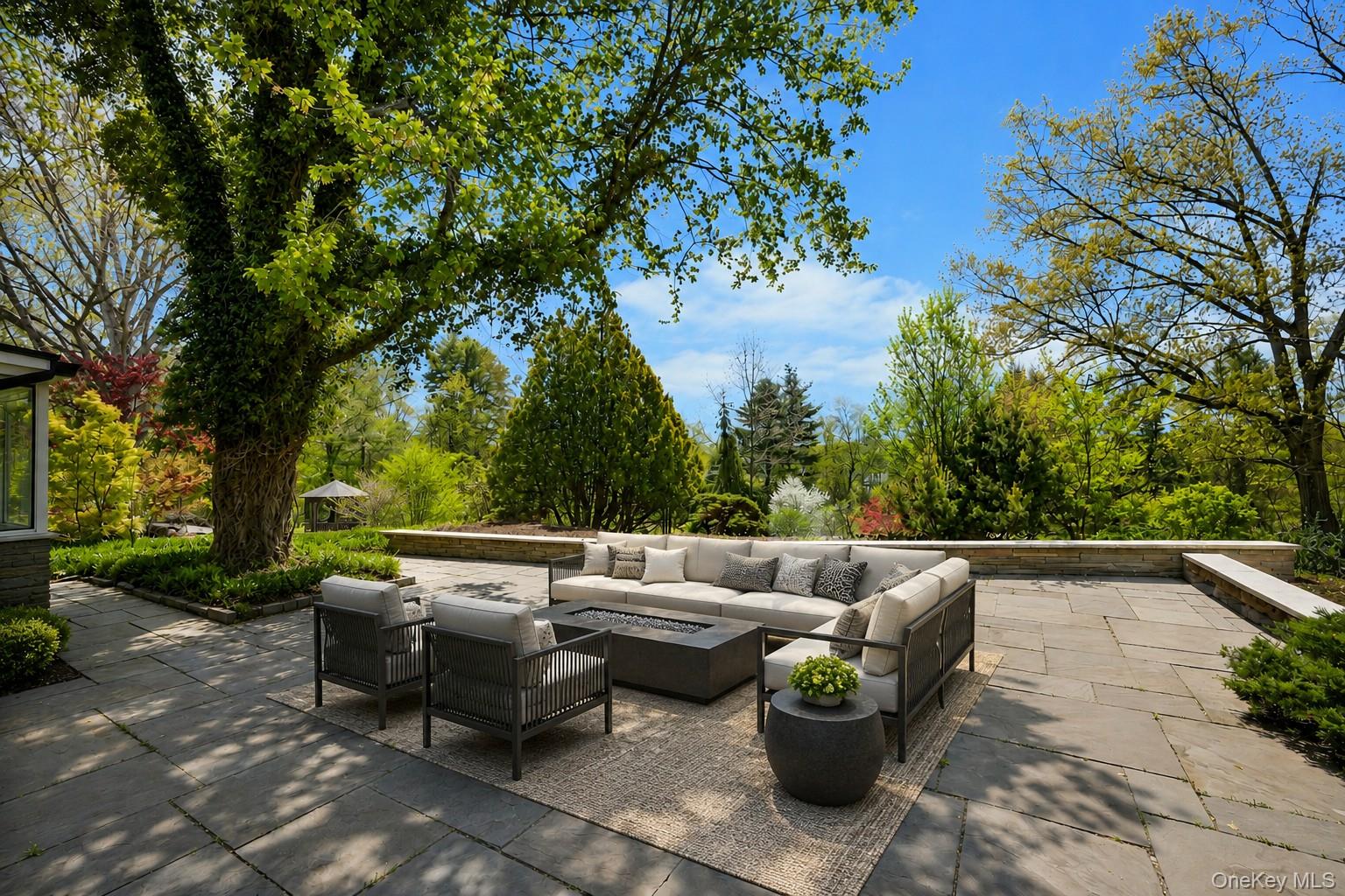 380 Cross River Road Katonah, NY 10536 - Photo 31 of 39 Amazing views of grounds and reservoir from patio - Virtually staged