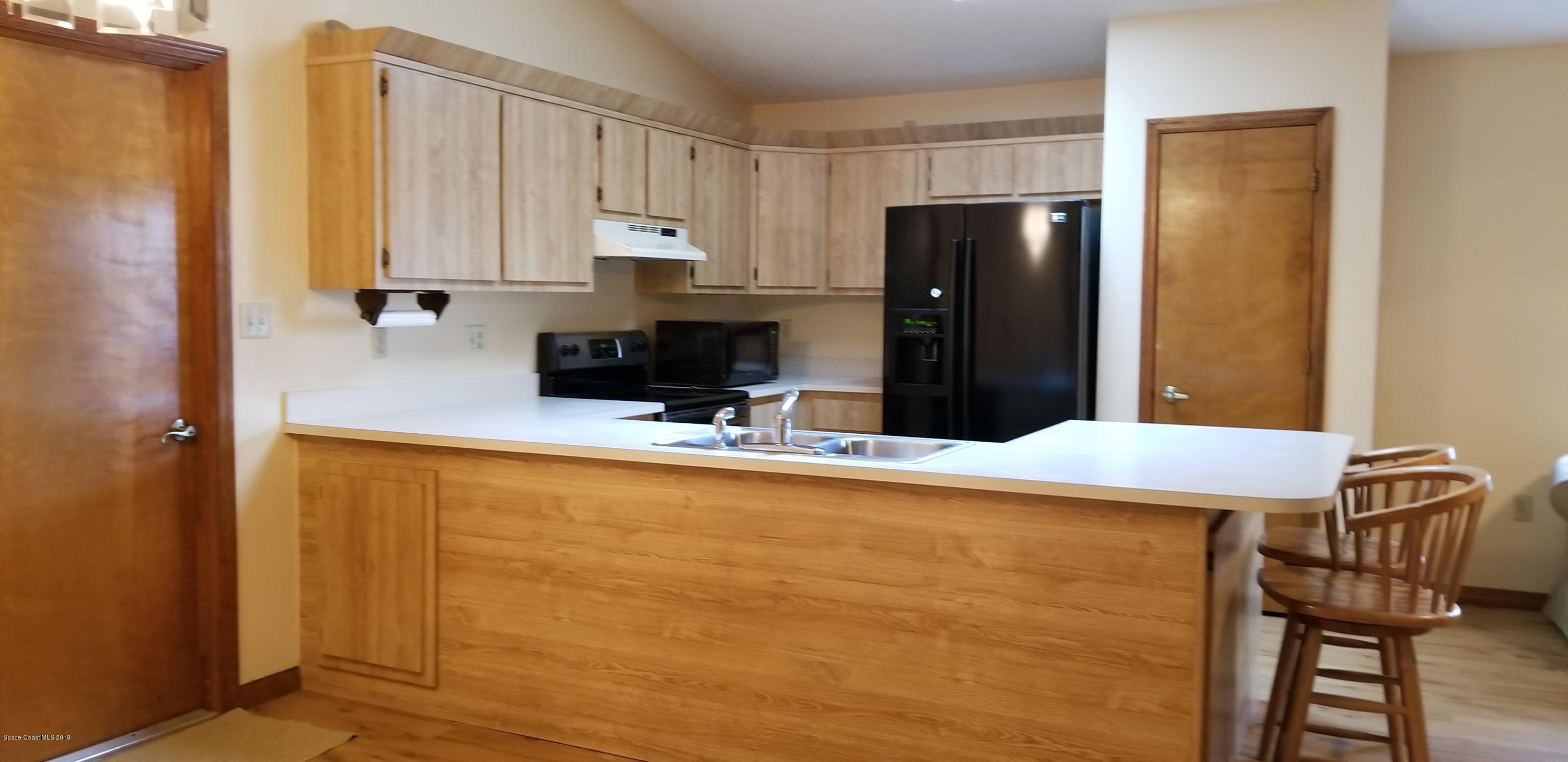 6870 Hartford Road Cocoa, FL 32927 - Photo 5 of 32 KITCHEN 2