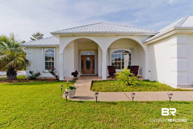31275 River Road Orange Beach, AL 36561 - Photo 9 of 32 Hurricane Shutters