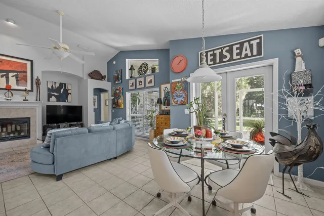 a outdoor living space with furniture and a flat screen tv