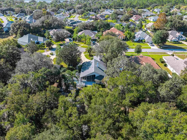 a view of a house with a big yard