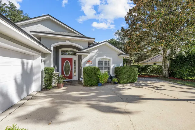 a view of a house with a street