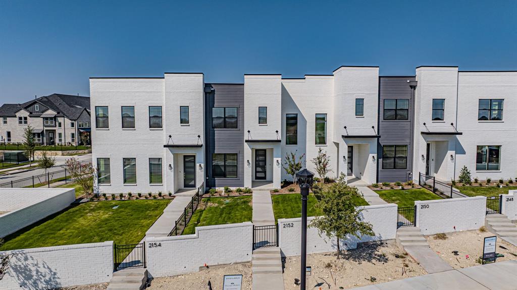 2152 Village Walk Lane Aledo, TX 76008 - Photo 1 of 40 Model home to tour in Walsh for those interested in building a new townhome.