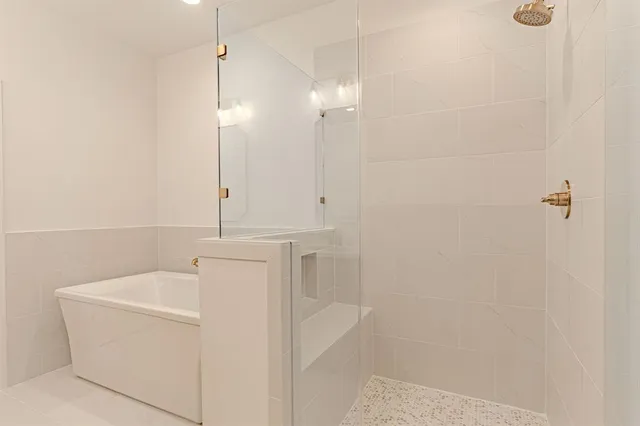 a bathroom with a sink double vanity and a mirror
