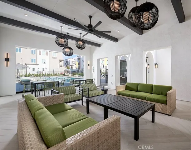 a kitchen with stainless steel appliances a sink a stove and cabinets