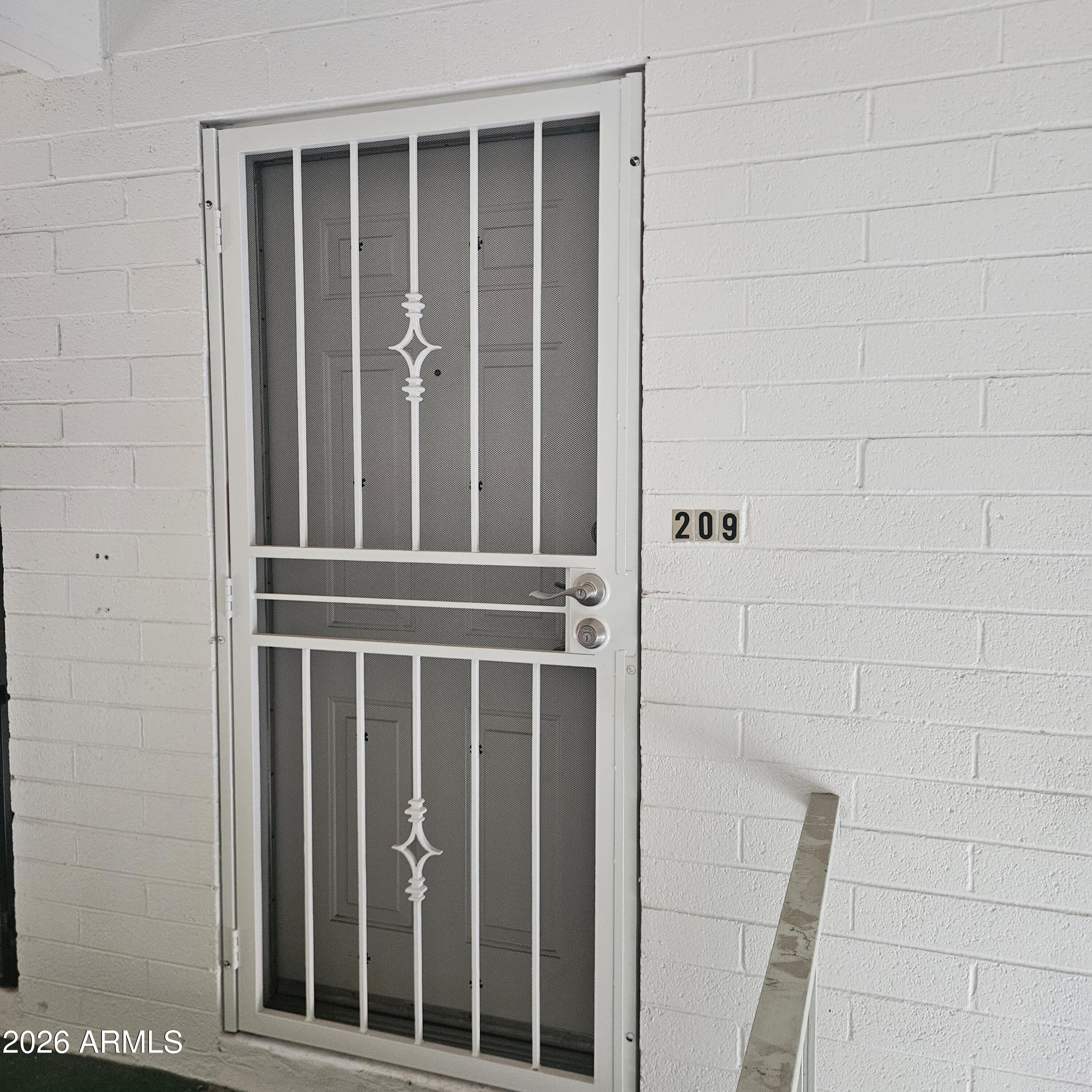 2575 West Berridge Lane, Unit D209 Phoenix, AZ 85017 - Photo 2 of 17 a view of wooden door