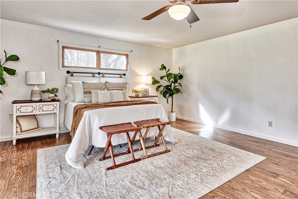 18501 Rustic Ridge Lower Lake, CA 95457 - Photo 18 of 46 a living room with furniture and a potted plant