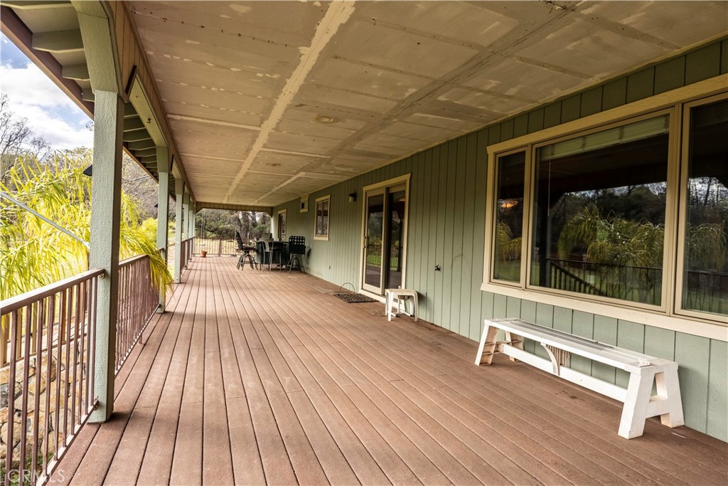 18501 Rustic Ridge Lower Lake, CA 95457 - Photo 32 of 46 a view of porch with furniture and wooden floor