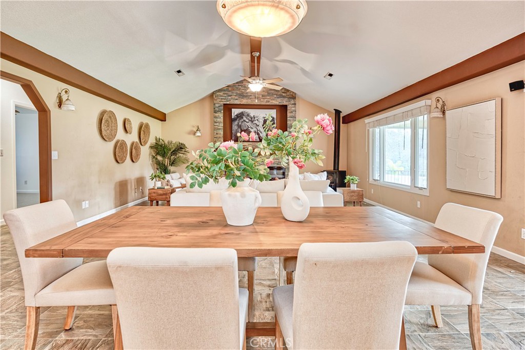 18501 Rustic Ridge Lower Lake, CA 95457 - Photo 10 of 46 a dining room with furniture and a chandelier
