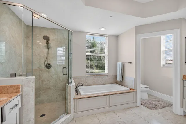 a room with a bed and a window